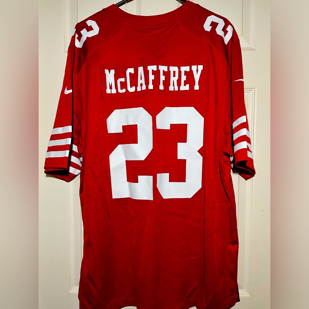 NEW WITH TAGS!! McCAFFREY #23 JERSEY!! MENS SIZE  XL